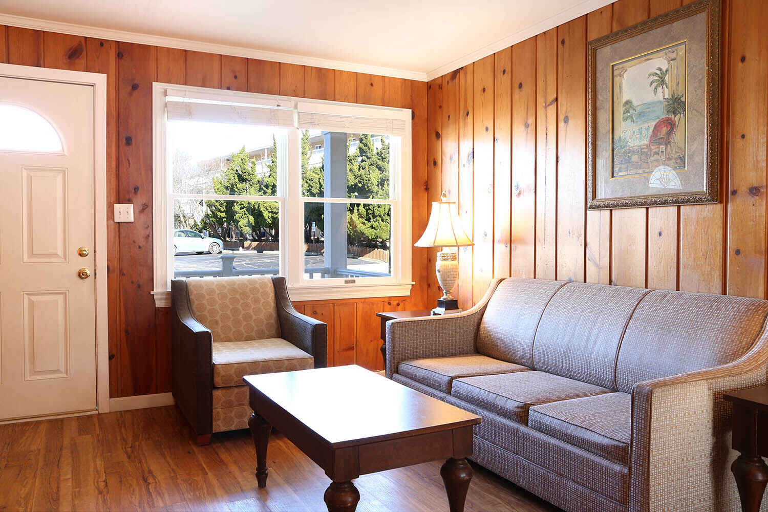 complete living and dining room area with couch and entertainment center