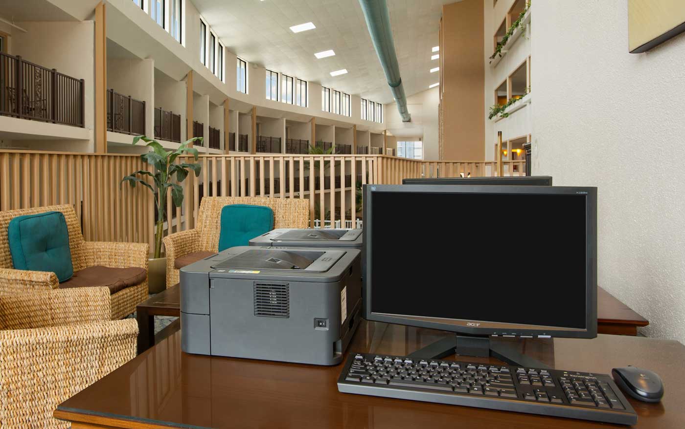 business work space computer printer lounge area